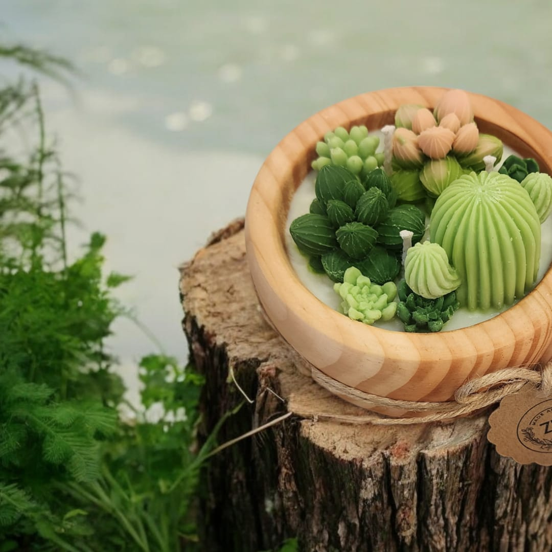 Velas en cuenco de madera